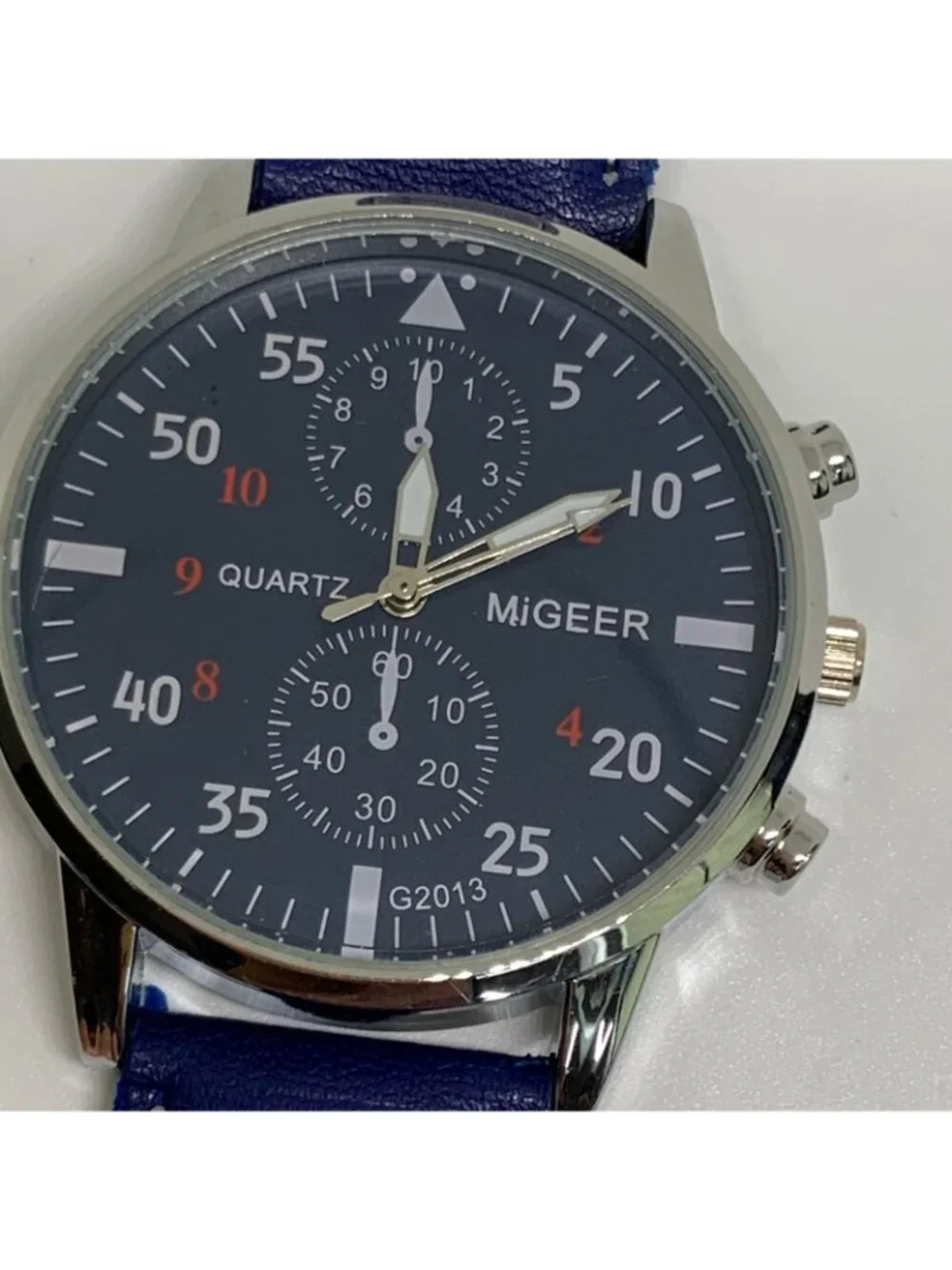 MiGEER men’s quartz analog watch 42mm silver tone blue dial leather running